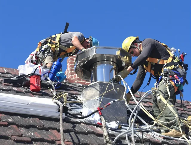 Protective chimney cap installed by Wayland Chimney Sweep in Wayland, MA